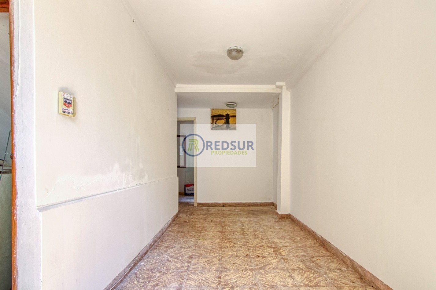 PROPIEDAD CON LOCAL COMERCIAL