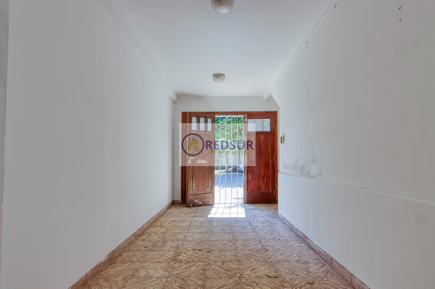 PROPIEDAD CON LOCAL COMERCIAL