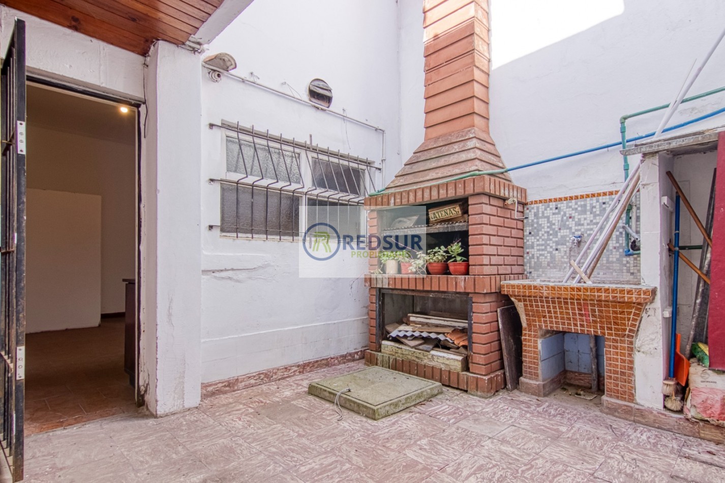 PROPIEDAD CON LOCAL COMERCIAL