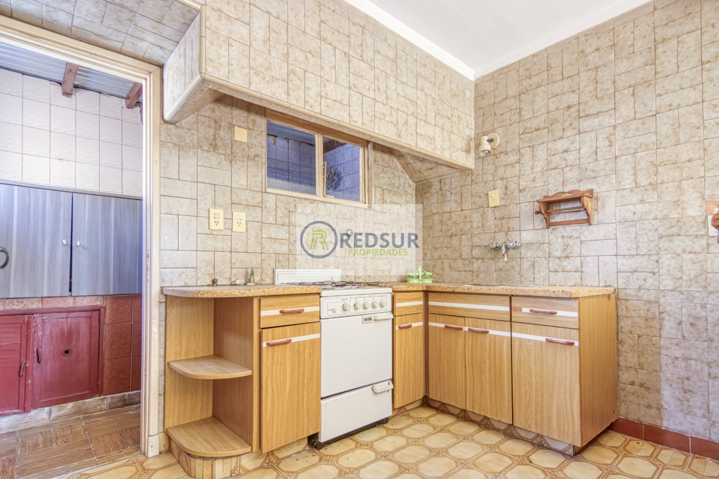 PROPIEDAD CON LOCAL COMERCIAL