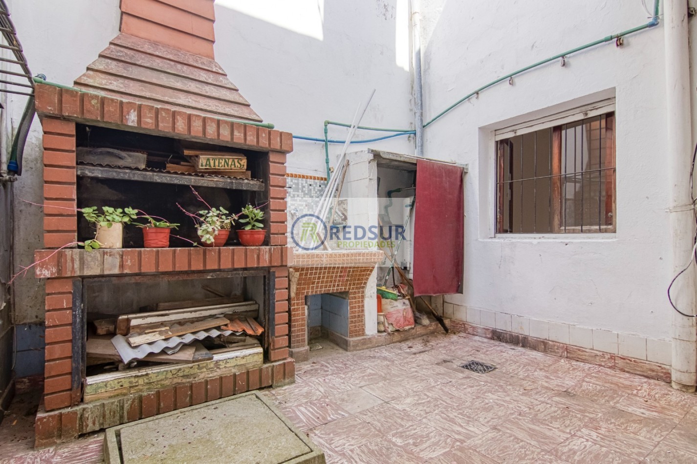 PROPIEDAD CON LOCAL COMERCIAL