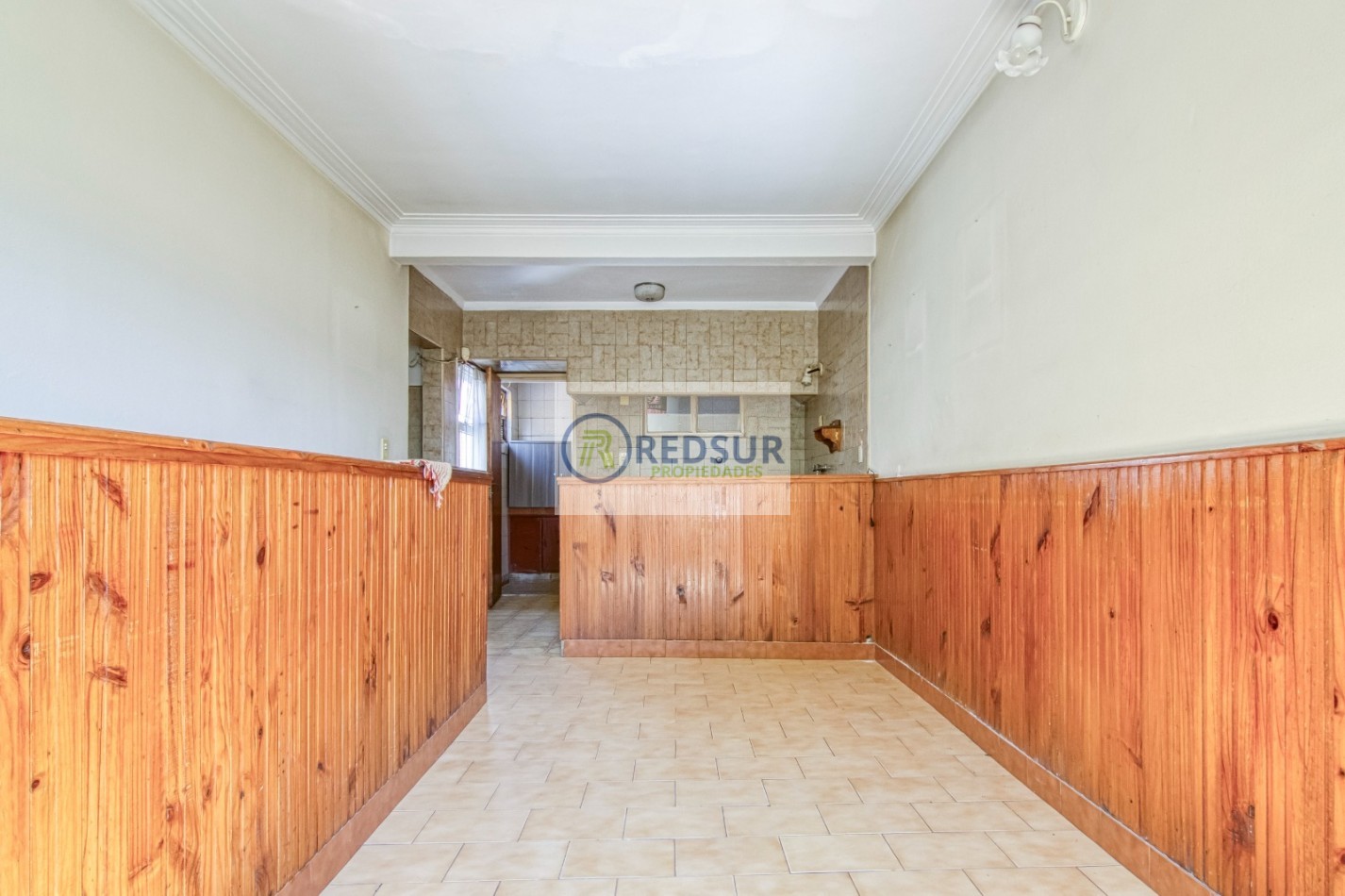 PROPIEDAD CON LOCAL COMERCIAL