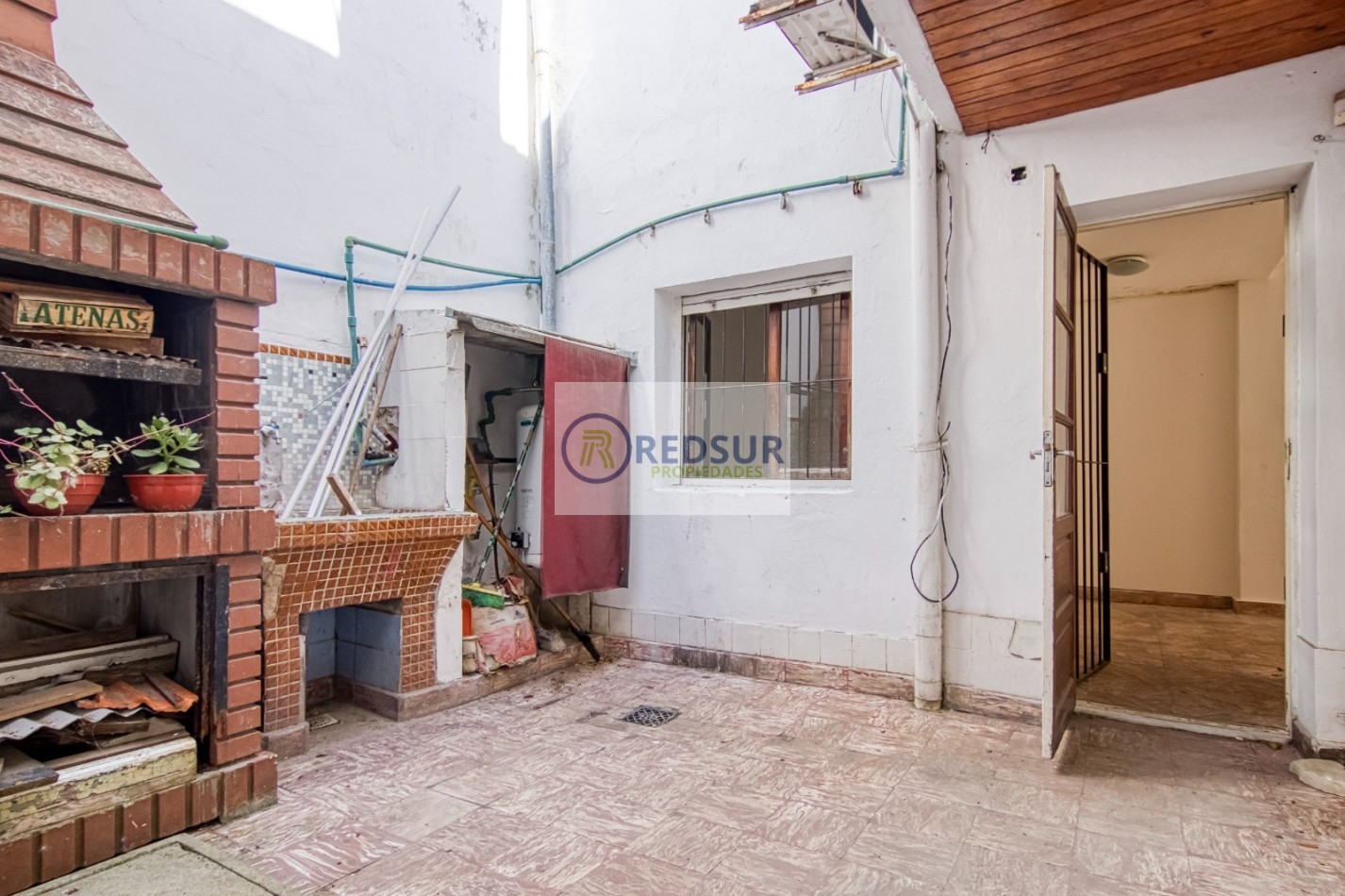 PROPIEDAD CON LOCAL COMERCIAL